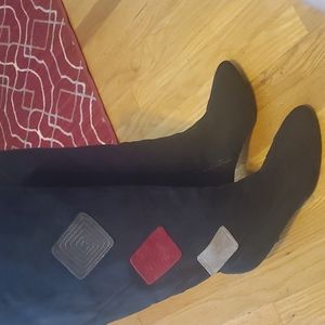 Wide-calf black boots with geo design in red and gray, size 10.